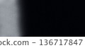 Grainy glowing noise gradient silver graphite poster backdrop with copy space black white texture 136717847