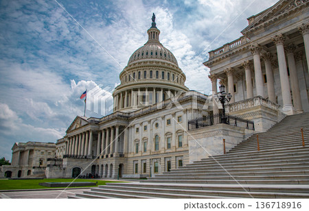 The Congress. Washington, DC landmark. American flag above the Congress. Washington DC skyline. Senate and House in Washington, DC, USA. 136718916