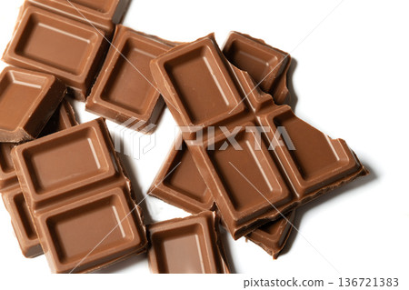 Product photography of overlapping milk chocolate Product photography of overlapping milk chocolate 136721383