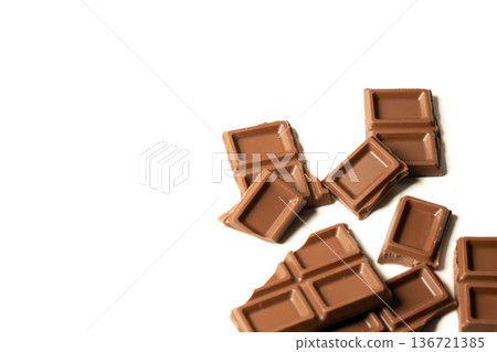 Studio shot of stacked broken chocolate bars Studio shot of stacked broken chocolate bars 136721385