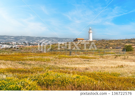 Paphos Lighthouse, Cyprus Landmark in Coastal Landscape under Blue Skies on Sunny Day. Paphos Lighthouse, Cyprus Landmark in Coastal Landscape under Blue Skies on Sunny Day. 136722576