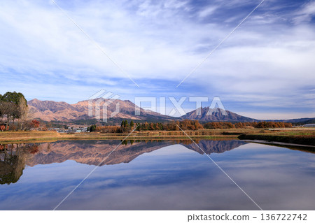 View of Mt. Nekodake and Mt. Takadake across the rural landscape of Minamiaso, Kumamoto Prefecture View of Mt. Nekodake and Mt. Takadake across the rural landscape of Minamiaso, Kumamoto Prefecture 136722742