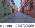 Empty Historic Street Leading To Church Tower In Poznan Poland 136723066