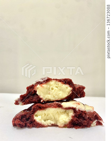 Freshly baked cookies with a golden-brown finish and chocolate chips. Perfectly crisp on the edges with a soft center, offering a delicious, comforting treat for any occasion. 136723088