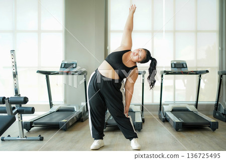 Healthy fat women.  Asian woman fitness exercise for lose weight. 136725495