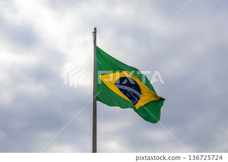 Brazilian flag waving in the wind Rio de Janeiro Brazil. 136725724
