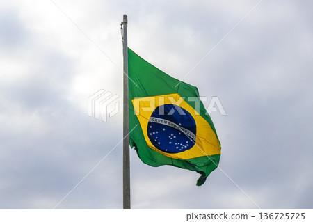Brazilian flag waving in the wind Rio de Janeiro Brazil. Brazilian flag waving in the wind Rio de Janeiro Brazil. 136725725