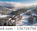 Aerial view of a lodge in the snowy mountains 136726798