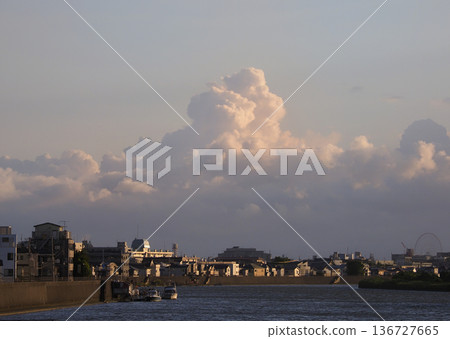 Cumulus clouds rising from below Cumulus clouds rising from below 136727665