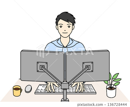 Male engineer concentrating on computer work using dual monitors 136728444