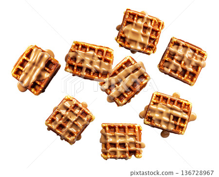 Golden brown square waffles drizzled with caramel sauce, in flat lay style isolated on white background, concept of sweet food 136728967