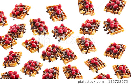 Belgian waffles with raspberries and chocolate isolated on white background as concept of tasty dessert 136728973