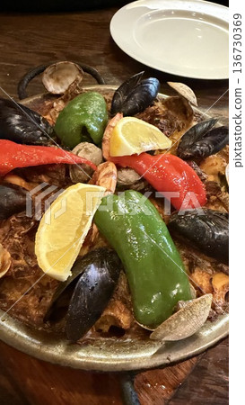 Spanish cuisine: Seafood paella 136730369