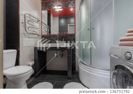 Modern Bathroom Interior with Red Ceiling and Washing Machine 136731792