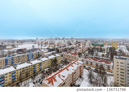 Aerial View of a Snowy Cityscape in Winter Aerial View of a Snowy Cityscape in Winter 136731796