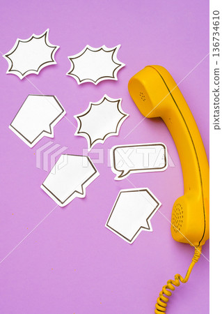 Colorful phone and speech bubbles on purple background showing conversation theme Colorful phone and speech bubbles on purple background showing conversation theme 136734610