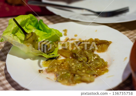 Chopped green peppers with lettuce leaf Chopped green peppers with lettuce leaf 136735758