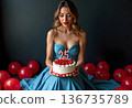 Birthday celebration. Young woman with gift and birthday cake with candles number 25. 136735789