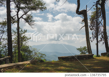sunrise with moving of cloud and clear sky and layer of mountain sunrise with moving of cloud and clear sky and layer of mountain 136735795