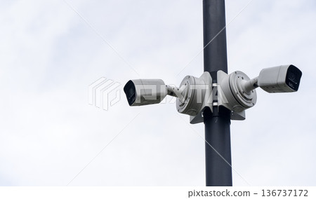 Surveillance Camera on Street Pole for Urban Security and Monitoring 136737172