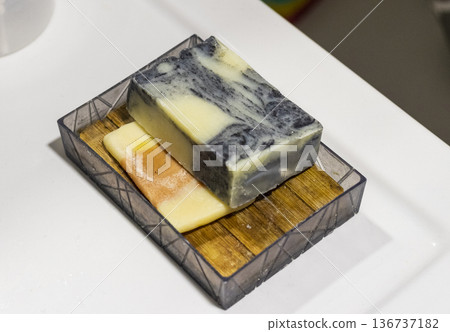 The soap bar holder with handmade bar soap containing activated charcoal, neem oil, hemp oil, and shea butter. The soap bar holder with handmade bar soap containing activated charcoal, neem oil, hemp oil, and shea butter. 136737182