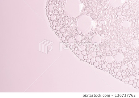 The texture of the foam of shower gel or soap suds or shaving foam. Macrophotography. Copy space 136737762