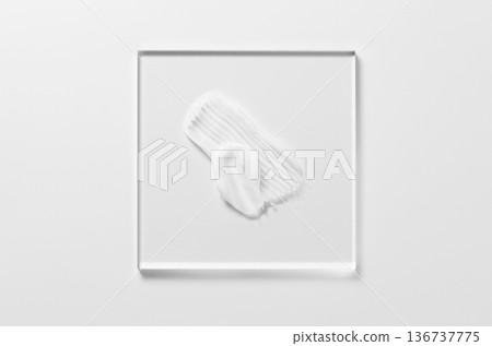 White cosmetic skin care product on glass. White background. 136737775