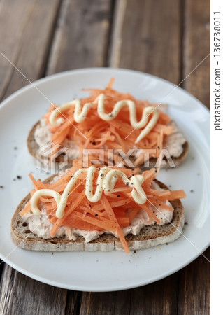 Tuna and carrot open sandwich made with Berliner Landbrot, a German rye bread Tuna and carrot open sandwich made with Berliner Landbrot, a German rye bread 136738011