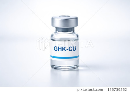 Glass vial labeled GHK-CU peptide cosmetic or medical serum isolated on white background 136739262