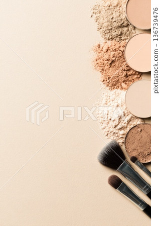 Makeup powder palette with brushes and neutral tones cosmetics flat lay background 136739476