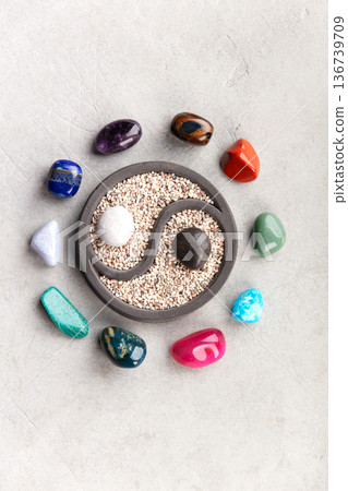 Yin Yang Zen Garden Surrounded by Colorful Healing Crystals Yin Yang Zen Garden Surrounded by Colorful Healing Crystals 136739709