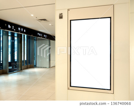 Digital signage installed in the elevator hall 136740068