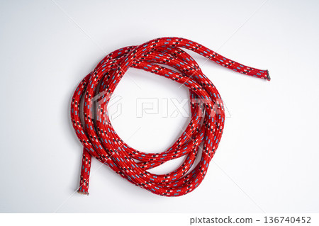 a red rope rolled up a red rope rolled up 136740452