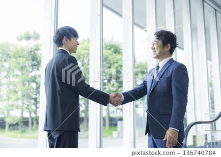 A businessman shaking hands A businessman shaking hands 136740784