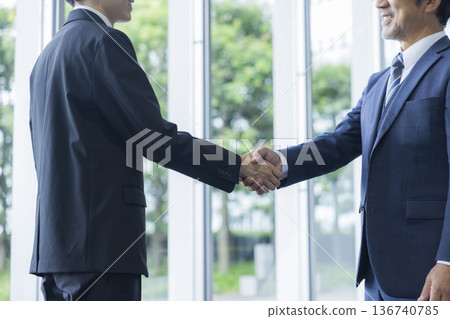 A businessman shaking hands A businessman shaking hands 136740785