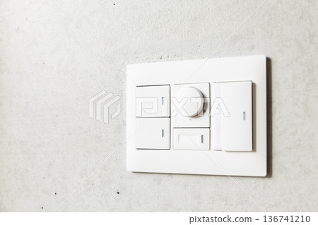 Switch on a concrete wall Switch on a concrete wall 136741210