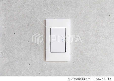 Switch on a concrete wall Switch on a concrete wall 136741213
