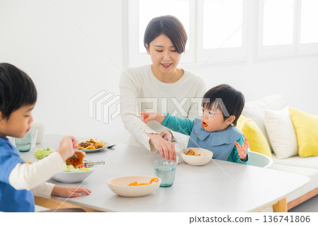 Family eating at the dining table Family eating at the dining table 136741806