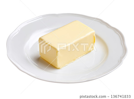 Butter stick on white plate 136741833