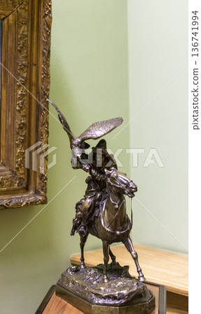 02.02.2026 - Minsk, Belarus -This bronze sculpture depicts a falconer on horseback on display of the museum 02.02.2026 - Minsk, Belarus -This bronze sculpture depicts a falconer on horseback on display of the museum 136741994