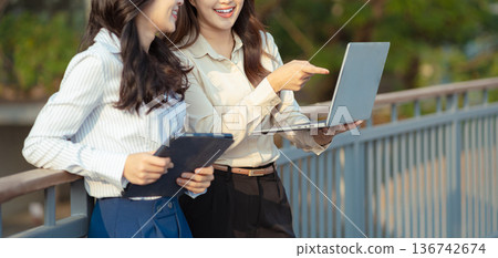 Project manager working and update tasks with milestones progress planning and professional investor working new start up project. Project manager working and update tasks with milestones progress planning and professional investor working new start up project. 136742674