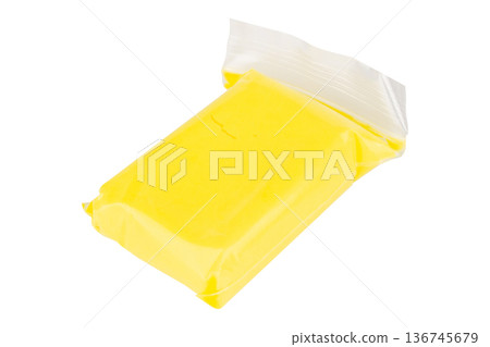 Color yellow modeling clay  clear plastic isolated on white background 136745679