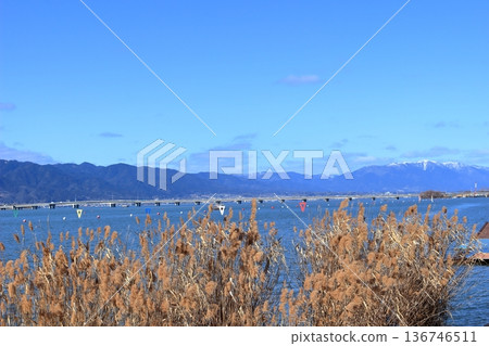 Snow-covered Mount Horai seen from the Seta River over Omi Ohashi Bridge 136746511