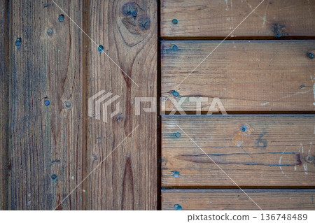Close-up view of horizontal and vertical wood panel masonry 136748489