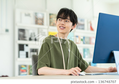 A young engineer man working in the office 136748707