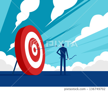 Business challenge. Businessman holds a bow and stands beside a large target. Business challenge. Businessman holds a bow and stands beside a large target. 136749702