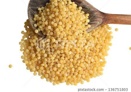 Dry couscous grain ready for cooking. Dry couscous grain ready for cooking. 136751803
