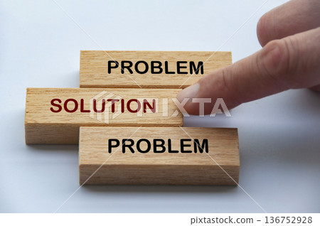 Problem and Solution text on wooden blocks illustrating solution focused thinking over repetitive issue cycles. Problem and Solution text on wooden blocks illustrating solution focused thinking over repetitive issue cycles. 136752928