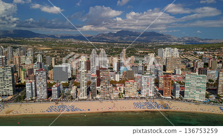 Aerial panoramic view of Benidorm city skyline and sandy beach with Mediterranean coastline Spain Aerial panoramic view of Benidorm city skyline and sandy beach with Mediterranean coastline Spain 136753259