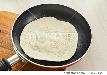 Tortilla making Tortilla making 136754353